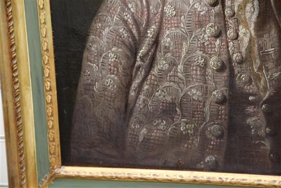 18th century English School Portrait of a gentleman wearing an embroidered silk jacket, 30 x 25in.